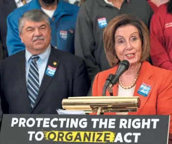  ?? J. Scott Applewhite/Associated Press ?? Speaker of the House Nancy Pelosi, D-Calif., joined at left by AFL-CIO President Richard Trumka, speaks during a February news conference about the Protecting the Right to Organize Act.