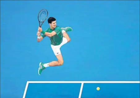  ?? GETTY ?? ■
Novak Djokovic on way to beating Roger Federer in the Australian Open semi-final and entering a record eighth final at Melbourne Park.