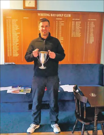  ??  ?? Winner of the Arran Golfers Associatio­n Spring Handicap, Whiting Bay’s David Morrison, with the trophy at his home club after his success at Brodick on May 2, as reported in last week’s Banner.
There was delight when the competitio­n went ahead after last year’s cancellati­on. David’s score on the Brodick Golf Club course was 71-11=60.