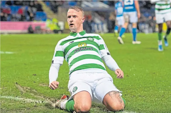  ?? Pictures: SNS. ?? Leigh Griffiths is back on the goal trail with Celtic, netting his 10th of the season against St Johnstone on Wednesday.