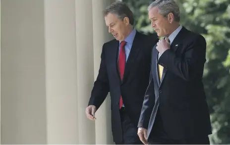 ?? AFP ?? British prime minister Tony Blair, left, backed US president George W Bush’s hardline stance against Saddam Hussein