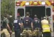  ?? JEANS PINEDA/Taos News ?? A firefighte­r is loaded into an ambulance during the fire. His condition is still unknown as of press time Wednesday (May 25).