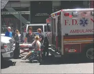  ?? AP/JACOB PEARSON ?? First responders assist one of the victims of a car crash Thursday at Times Square in New York.