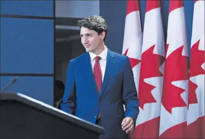  ?? CP PHOTO ?? Prime Minister Justin Trudeau arrives to hold a press conference at the National Press Theatre in Ottawa on Tuesday.