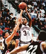 ?? Robert W Stowell Jr / Getty Images ?? UConn's Ray Allen shoots over the defense in Hartford in 1994.