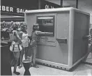  ?? JOURNAL SENTINEL FILES MILWAUKEE ?? People utilize a TYME machine in 1978 at Brookfield Square.
