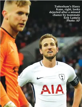  ??  ?? Tottenham’s Harry Kane, right, looks dejected after a missed chance by teammate Erik Lamela Photo: AP