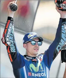  ?? AFP PHOTO ?? EXTENDS LEAD: Spanish rider Maverick Vinales holds his trophy aloft after winning the French MotoGP at Le Mans yesterday