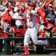  ?? AP/JEFF ROBERSON ?? Tommy Edman celebrates as he rounds the bases after a home run he hit for the St. Louis Cardinals on Wednesday in their victory over the Washington Nationals. Edman was the 10th St. Louis player to hit his 10th home run this season.