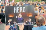  ?? AFP ?? An activist in Washington DC holds a poster of Christine Blasey Ford, who has accused Kavanaugh of assaulting her in 1982.