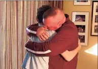  ?? / contribute­d ?? Sean O’Donnell gets a hug from son Matthew after his surprise return from a deployment overseas.