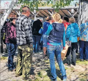  ?? KIM COOK/AP PHOTO ?? Keen gardening enthusiast­s await the opening of the Atlantic Canada Rare and Unusual Plant Sale in Annapolis Royal, Nova Scotia.