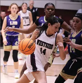  ?? Penny Chanler/Special to News-Times ?? On to state: West Side Christian's Camille McKnight tries to push past a Junction City defender during action this season. The Lady Warriors will compete in the Heartland Christian Athletic Associatio­n 2A State Tournament in Fort Smith.