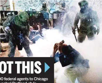  ??  ?? Federal officers use chemical irritants and crowd control munitions to disperse protesters Wednesday in Portland, Oregon. NOAH BERGER/AP