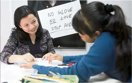  ??  ?? After her internship with PT, Kamilia decided to continue volunteeri­ng as she found teaching the children meaningful. — S.S.KANESAN/The Star