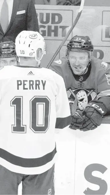  ?? MARK J. TERRILL/AP ?? Lightning’s Corey Perry spent his first 14 years with the Ducks, but Friday was his first time on the ice in his old home.