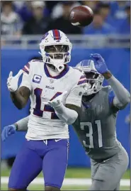  ?? (AP/Duane Burleson) ?? Stefon Diggs’ (left) 36-yard reception helped set up Tyler Bass’ 45-yard field goal in the fourth quarter to give the Buffalo Bills a 28-25 win over the Detroit Lions on Thursday at Ford Field in Detroit. Diggs caught 8 passes for 77 yards and a touchdown.