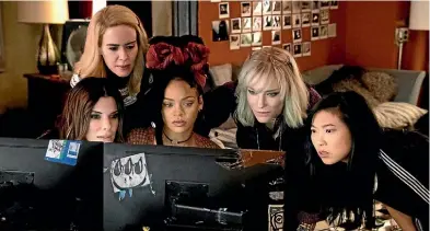  ??  ?? Sandra Bullock, Sarah Paulson, Rihanna, Cate Blanchett and Awkwafina plot the impossible in Ocean’s 8.