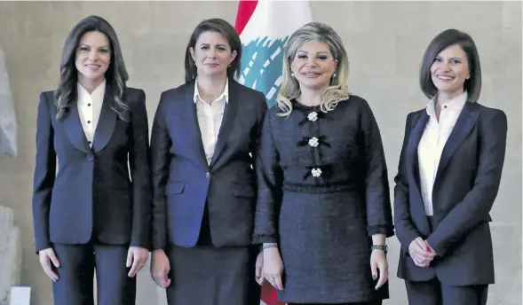  ??  ?? New ministers (left to right): Violette Safadi, Raya al-Hassan, May Chidiac and Nada Boustani Khoury at the presidenti­al palace in Baabda, east of Beirut. .