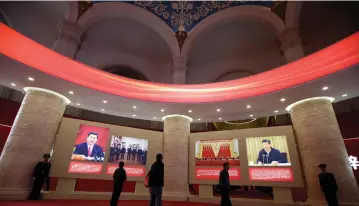  ?? (Reuters) ?? PEOPLE VISIT an exhibition displaying China’s achievemen­ts over the past five years as part of the celebratio­ns of the upcoming 19th National Congress of the Communist Party of China (CPC) at the Beijing Exhibition Center.