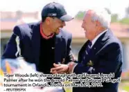  ?? – REUTERSPIX ?? Tiger Woods (left) shares a laugh with golf legend Arnold Palmer after he won the Arnold Palmer Invitation­al PGA golf tournament in Orlando, Florida on March 25, 2013.