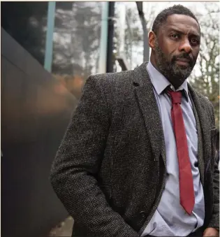  ??  ?? Idris Elba as John Luther with Wunmi Mosaku, who plays new recruit DS Catherine Halliday