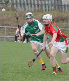  ??  ?? Jack Kirwan (Rapparees) and Caellum Travers-Devlin of Naomh Eanna in a race for possession.