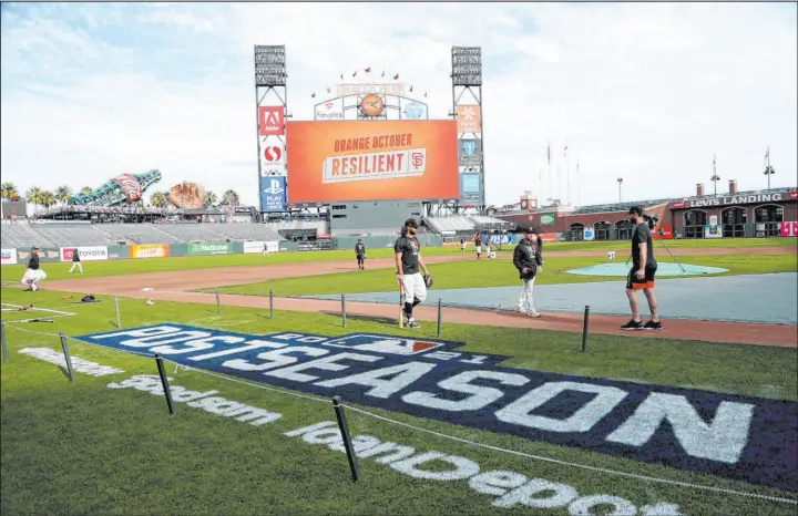  ?? Jed Jacobsohn The Associated Press ?? The San Francisco Giants work out Thursday at Oracle Park for their National League Division Series against the Los Angeles Dodgers, which starts Friday.