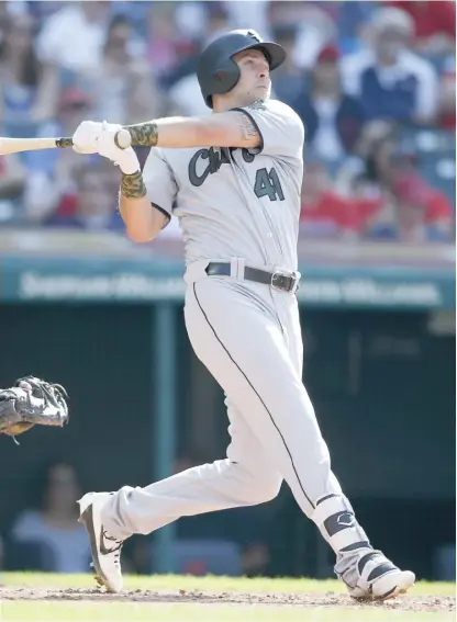  ?? RON SCHWANE/ GETTY IMAGES ?? Matt Skole follows the flight of his home run off Indians starting pitcher Adam Plutko in the fourth inning.