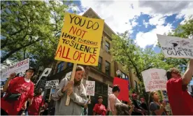  ?? Photograph: Adam Fondren/AP ?? Demonstrat­ors protest against the Keystone XL pipeline in Rapid City, South Dakota, on 12 June 2019.