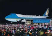  ?? JACK RENDULICH — THE ASSOCIATED PRESS ?? The crowd cheers as Air Force One arrives with President Donald Trump at Duluth Internatio­nal Airport on Wednesday, Sept. 30.