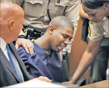  ?? Al Seib Los Angeles Times ?? BRANDON SPENCER breaks down in tears after being sentenced to 40 years to life in prison, the minimum, for a 2012 shooting that that wounded four people outside a Halloween party on the USC campus.