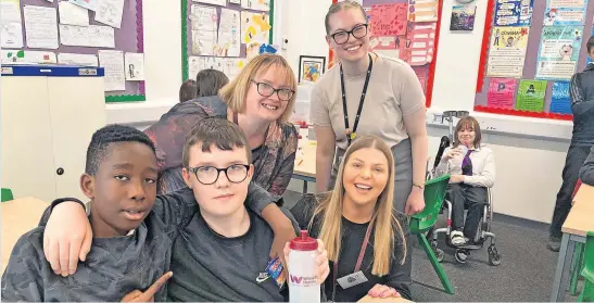  ?? ?? Sharing ideas S2 English pupils Lyle, Chi Chi and right, Alicia, with Joanne Threlkeld, Caitlin Wallace and Kelly Trainor at the Lochside Regenerati­on Project focus day
