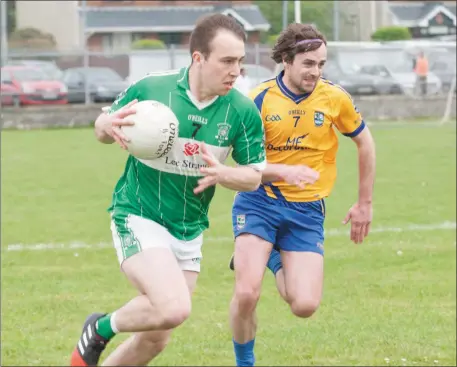  ??  ?? Na Gaeil’s Andrew Barry in action against Beaufort’s James O’Reilly in last year’s the County Junior Premier Club Championsh­ip at Killeen, Tralee. The teams and players meet again on Sunday, this time in the County Premier JFC Final in Austin Stack...