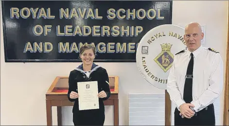  ?? Picture: Royal Navy ?? THANKS, DAD! Able Seaman Henrietta Goodrum had just graduated from her Leading Rates’ leadership course at HMS Collingwoo­d in Fareham, when she was surprised by her father, 40-year Commander Simon Goodrum