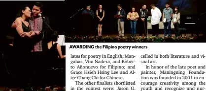  ??  ?? BANAUE and Dondi Ong, Mary Anne Espina
AWARDING the Filipino poetry winners