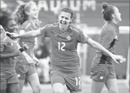  ?? Andy Jacobsohn Associated Press ?? CHRISTINE SINCLAIR of Canada, the top scorer in women’s soccer internatio­nal play, has become a star in a country starved for female role models in sports.