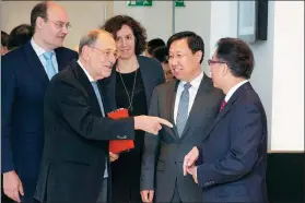  ?? KUANG LINHUA / CHINA DAILY ?? Javier Solana, former NATO secretary-general and Spanish foreign minister, speaks with Wang Xiaohui (second from right), executive deputy head of the Publicity Department of the Communist Party of China Central Committee, and Irene Lozano (center), state secretary for Global Spain, on the sidelines of the China-Europe Forum on Reform and Globalizat­ion in Madrid, Spain, on Thursday.