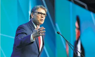  ?? Michael Wyke / Contributo­r ?? Energy Secretary and former Texas Gov. Rick Perry said gas is cheap now but “interrupti­ble” during Wednesday’s luncheon at CERAWeek by IHS Markit at the Hilton Americas-Houston Hotel in Houston.