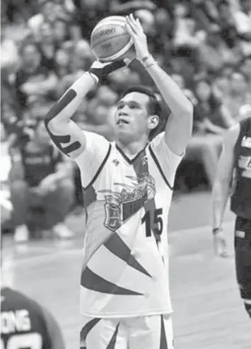  ?? PBA IMAGES ?? June Mar Fajardo shoots at the free throw line during San Miguel Beer's recent game against Meralco.