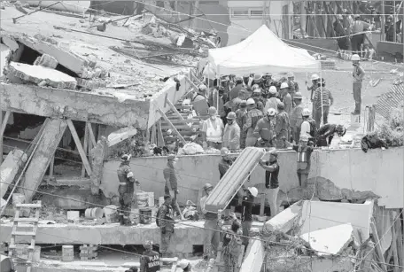  ?? Photograph­s by Gary Coronado Los Angeles Times ?? MEXICO CITY’S Enrique Rebsamen school is among the buildings under criminal investigat­ion after last month’s deadly 7.1 earthquake.