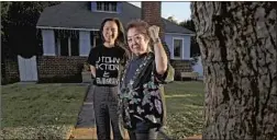  ?? Luis Sinco Los Angeles Times ?? ANA IWATAKI, left, an organizer for J-Town Action & Solidarity, with her aunt, Miya Iwataki, a longtime activist, in South Pasadena.