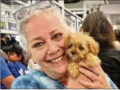  ?? COURTESY ?? Jennifer Siegel of Bosley’s Place holds Sweetpea, the tiniest participan­t ever on Animal Planet’s Puppy Bowl.