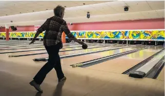  ??  ?? Best admitted she was more nervous being photograph­ed bowling for this story than she was when she put up her perfect 300 game. Despite her initial reluctance, she recorded seven strikes on 10 attempts in front of the camera.