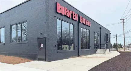  ?? PHOTOS BY ED SEMMLER/SOUTH BEND TRIBUNE ?? Burn ‘Em Brewing recently moved to a new home in Michigan City near Blue Chip Casino. The new location will include a restaurant, event space and nearly two dozen taps.