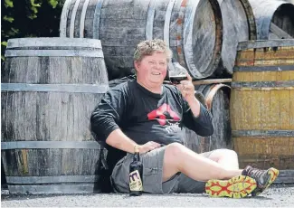  ?? Photo: ROBERT CHARLES/FAIRFAX NZ ?? Taste test: Mike’s Brewery owner Ron Trigg samples some of his famous whisky porter.