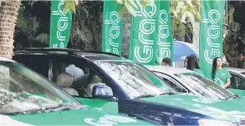  ??  ?? Goh said the company was also actively looking for ways to help drivers earn more, such as through ancillary income, without raising the price of its service. — Bernama photo