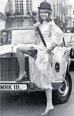  ??  ?? Joanna Lumley, below left, in her Silk Road Adventure series, and, left, the infamous photocall outside the Dorchester in 1976 where she was forced to pull up her skirt and tuck a gun in her stocking