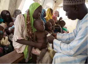  ?? FLORIAN PLAUCHEUR|AFP ?? Mulheres e crianças na chamada Bacia do Lago Chade precisam de ajuda humanitári­a