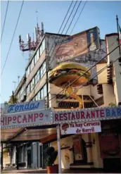  ??  ?? 1_Example of street art. 2_Interior of the popular Roma market. 3_Replica of the Cibeles fountain of Madrid. 4_Local barber. 5_Building known as La Casa de las Brujas (House of the Witches). 6_Dulcería Celaya, open since 1874. 7_Typical cake shop.